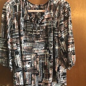 Womens 3/4 sleeved blouse. Size medium